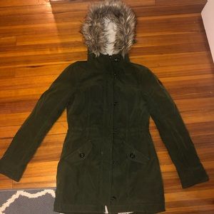 Green parka with detachable fur hood